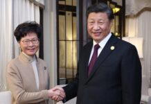 习近平见民调冷冰冰的林郑 上海送温暖