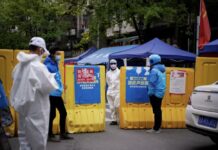 武汉当局提醒市民城开封后风险仍高 清明节全国哀悼疫情逝者